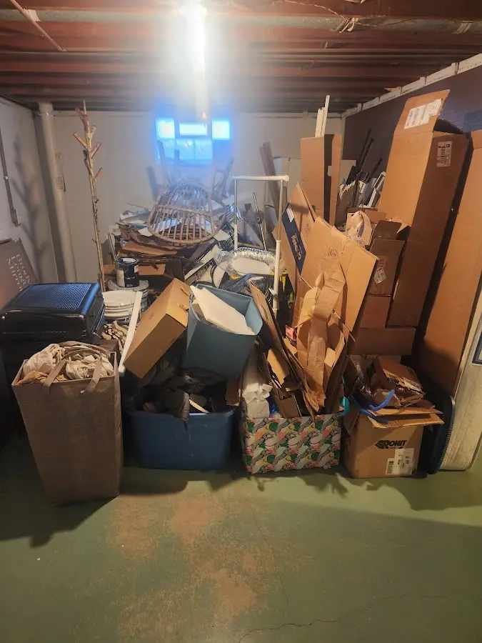 Roll-off dumpster container at job site for 4 Yard Dumpster Rental in Valley Falls